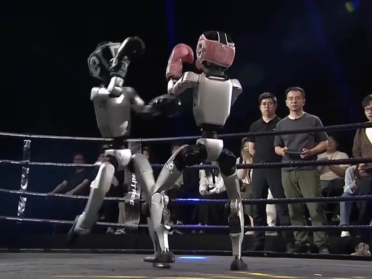  Unitree G1 Humanoid Robot Boxing_ All the WILDEST Highlights _ What The Future 1-55 screenshot.jpg - YouTube / CNET 
