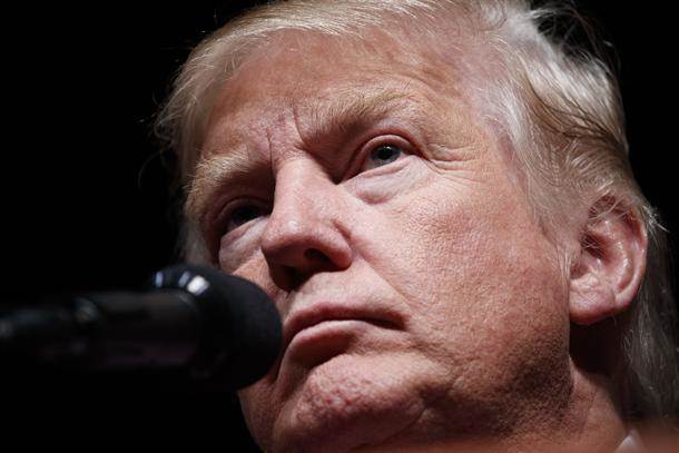   - AP Photo/ Evan Vuchi 