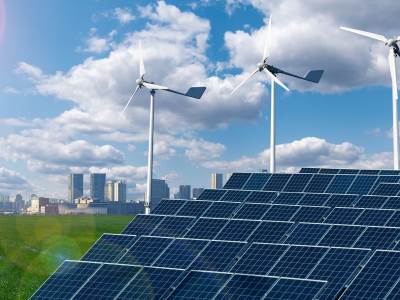 wind-turbines-solar-panels-eco-cityscape-getty-1322102768.jpg 